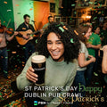 Person holding a Guinness beer mug in a pub celebrating St. Patrick's Day with music and confetti. PBM AI Prompt Packs Logo.
